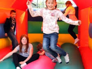 How many people can different inflatable jumping castles hold?